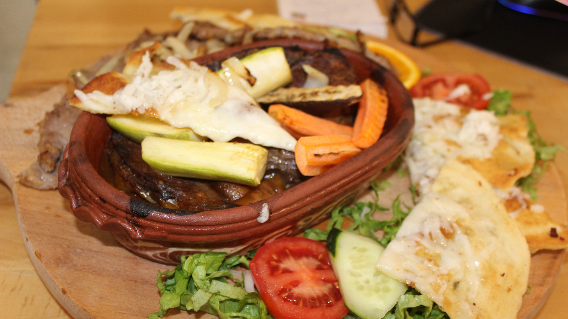 Traditional Albanian meat cooked in an earthen dish