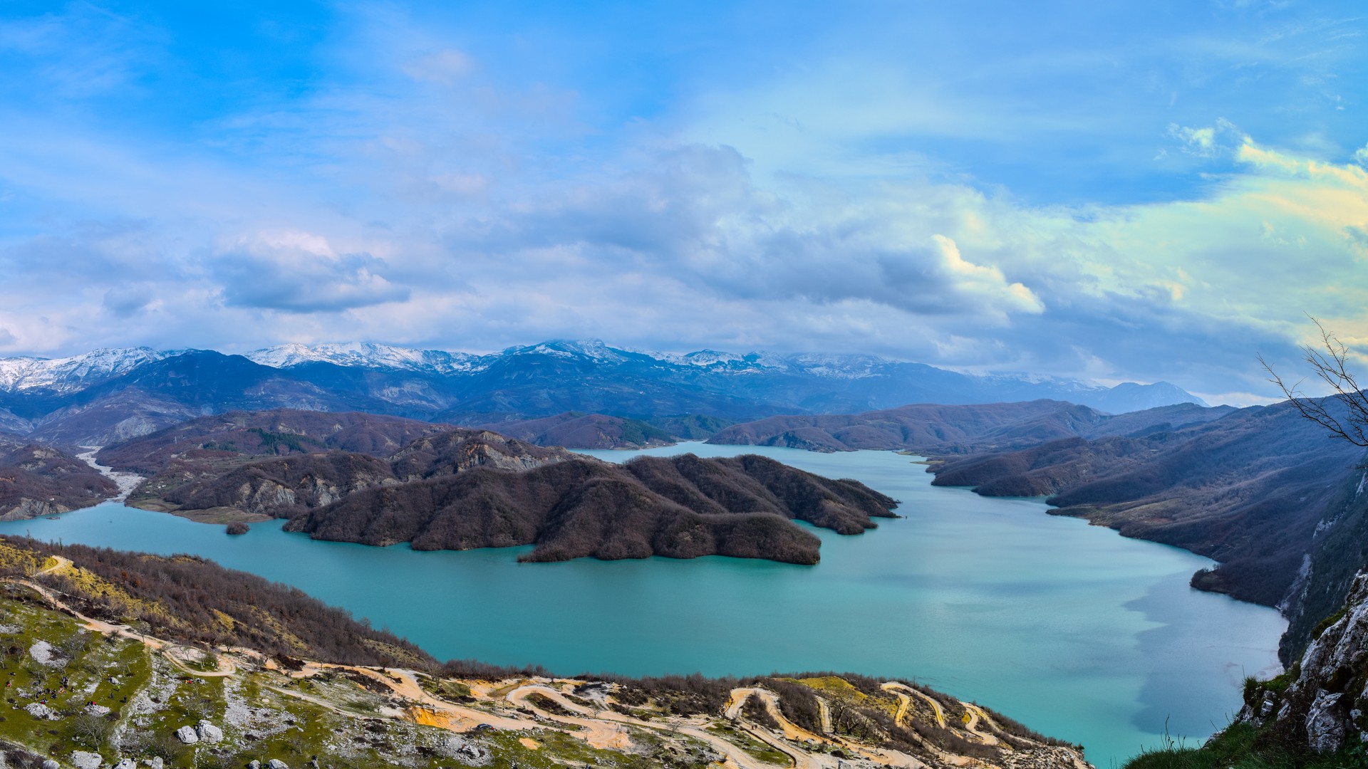 Turquoise waters and mountain scenery at Lake Bovilla