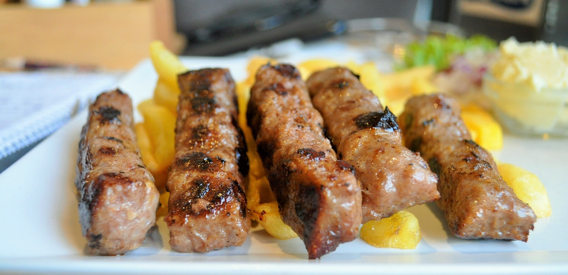 Ćevapi, a traditional Balkan grilled meat dish